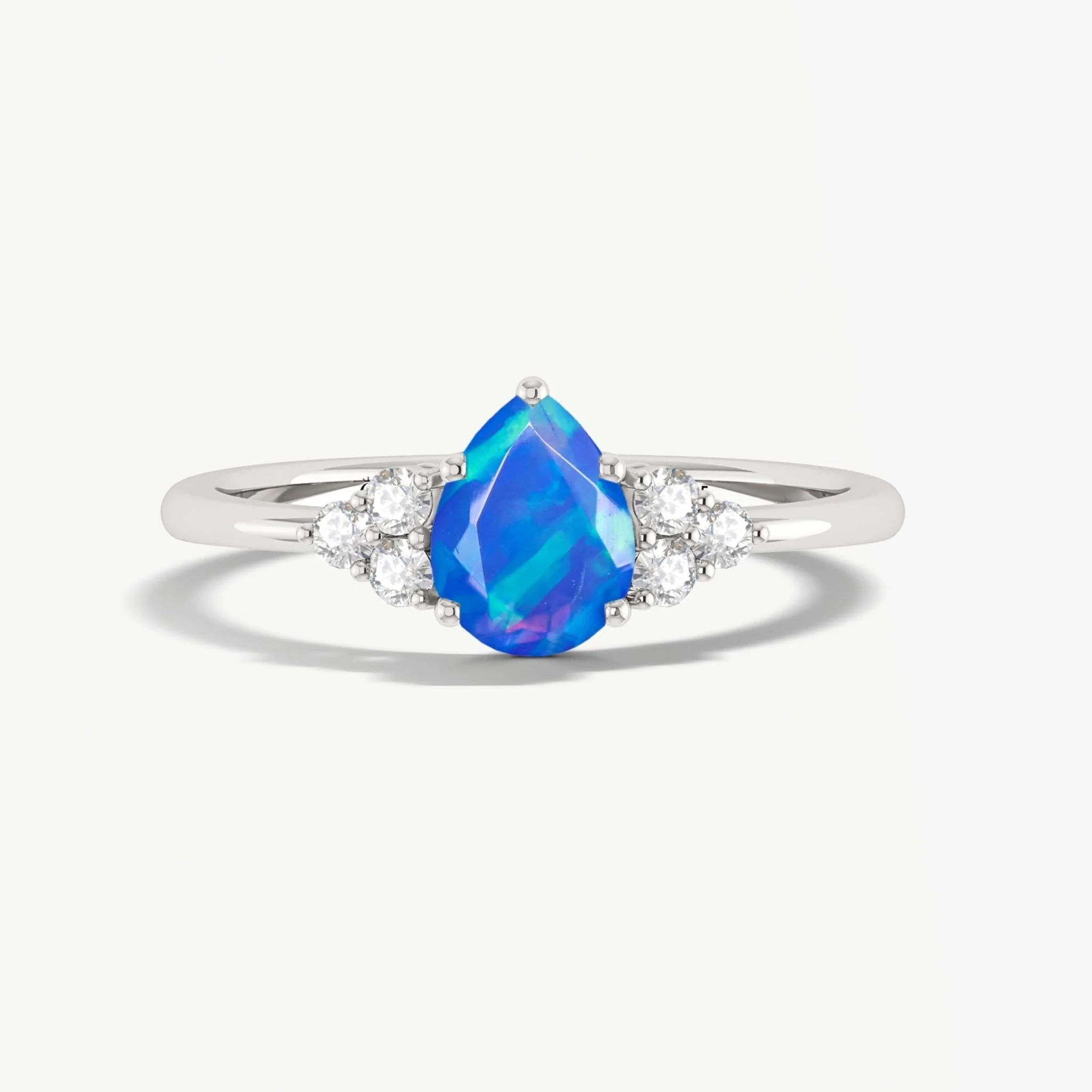 Natural Blue Opal Pear Shape & White Zircon Solitaire with Accents Ring