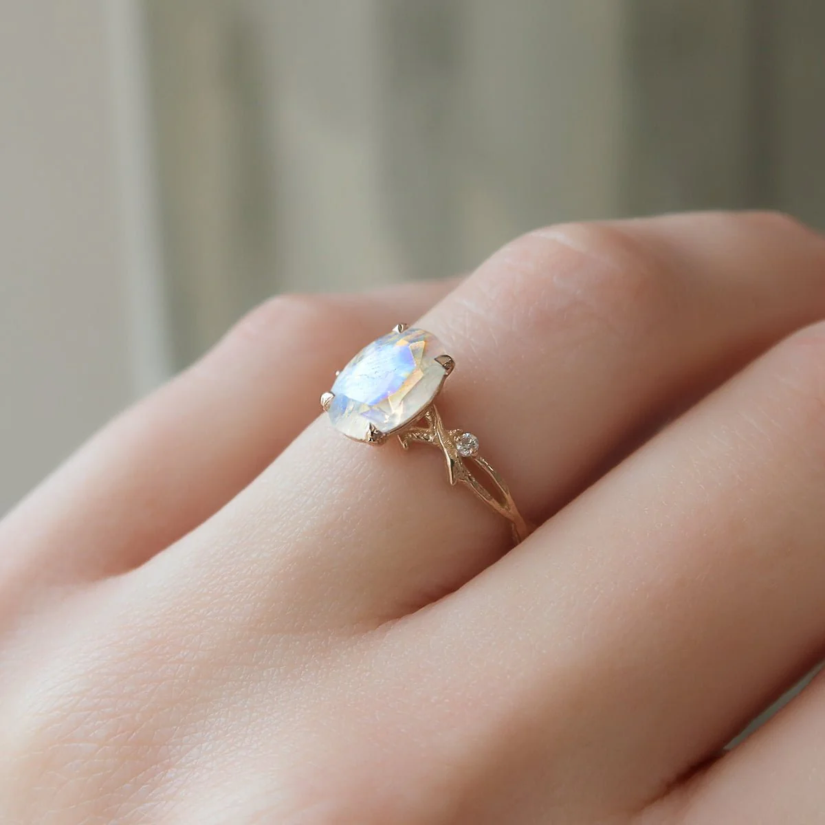 Natural Moonstone with Side Stone Crossover Solitaire Ring - Image 2