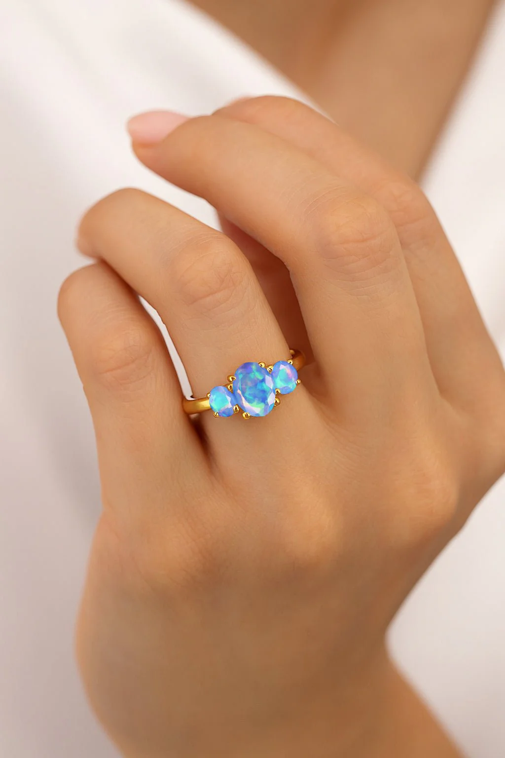 Stunning Blue Opal Three Stone Wedding Rings - Image 2